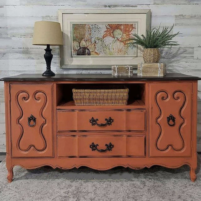 Retique It Renaissance Furniture Paint in Spiced Cider applied to a dresser, showcasing a warm, rustic finish in a 16 oz container.
