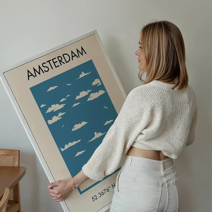 Amsterdam Tourist Style Print held up against a living room wall