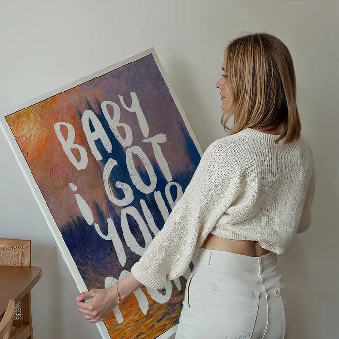 Baby I got your Monet Altered Art Print held up against a living room wall