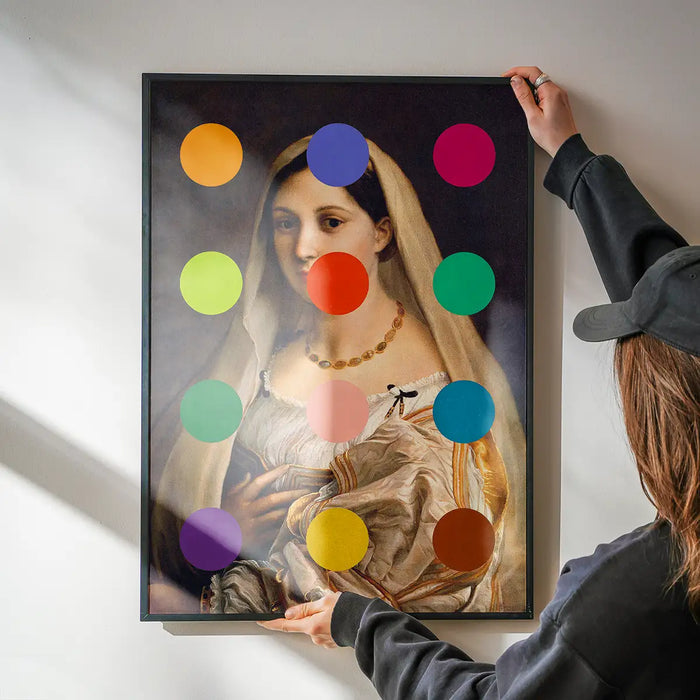 Dots Portrait Altered Art Print 2 being hung on a wall in a black frame