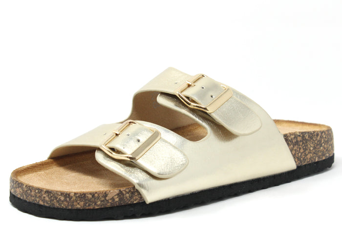 A pair of double strap sandals with buckles and a cork look sole in a gold color.