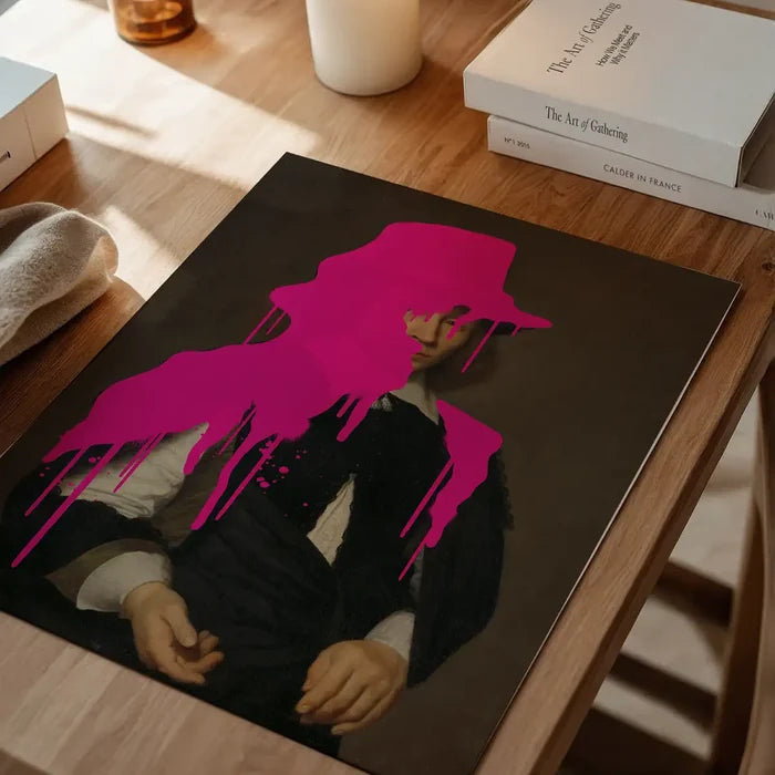 Drippy Dirck Portrait Print, quirky altered art print unframed on a home office desk
