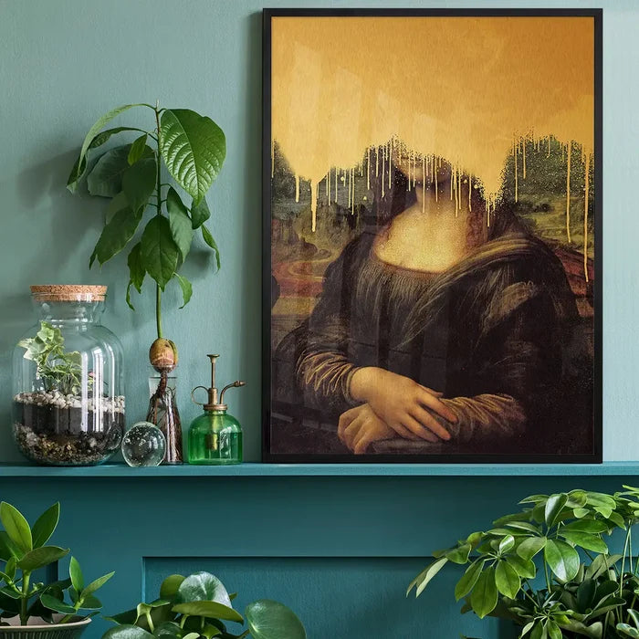 Drippy Mona Lisa Gold Graffiti Print, quirky altered art print black framed on a living room shelf