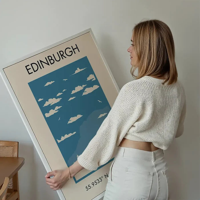 Edinburgh Tourist Style Print held up against a living room wall