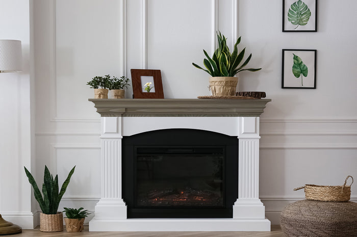 Retique It Weathered Wood stain kit for fireplace mantels, showcasing a rustic wood finish on a wooden mantel.