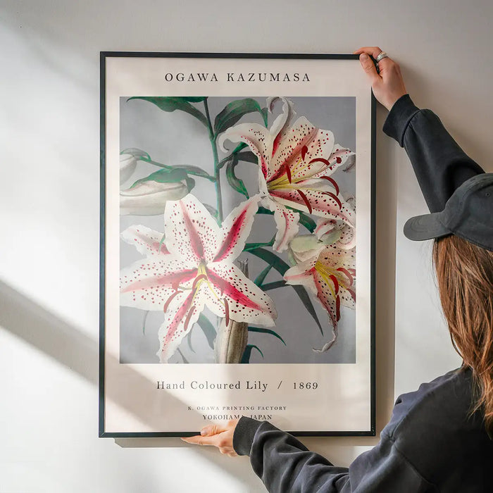 Japanese Flowers Ogawa Kazumasa Flowers Print being hung on a wall in a black frame