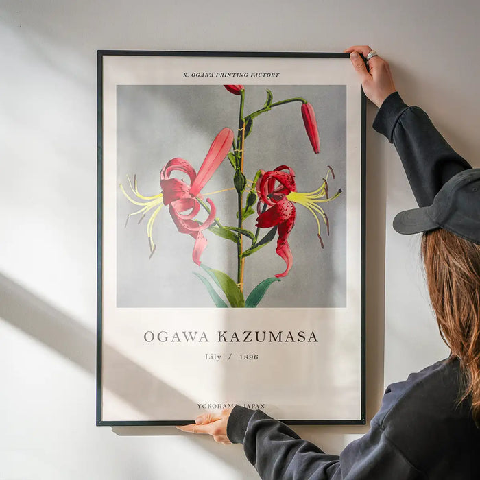 Lily Ogawa Kazumasa Flowers Print being hung on a wall in a black frame