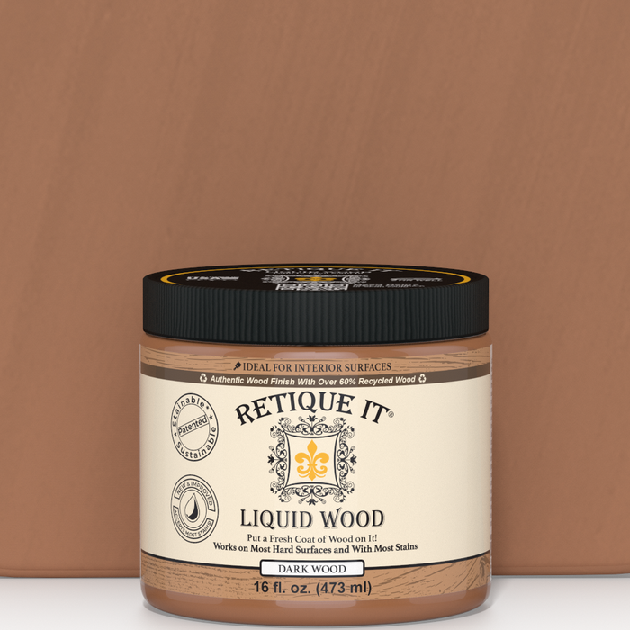 Dark Liquid Wood paint by Retique It for interior wood surfaces, shown in a sleek, smooth application on a finished wood panel.