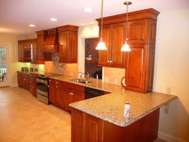 Retique It Liquid Wood Kit with traditional cherry oil-based stain applied to a kitchen surface, showcasing wood staining results.