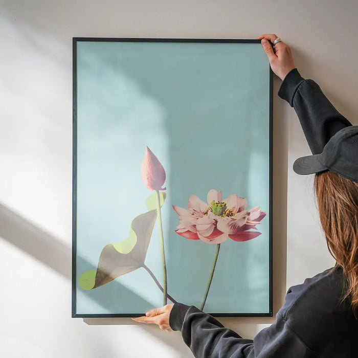 Lotus Flower Ogawa Kazumasa Flowers Print being hung on a wall in a black frame