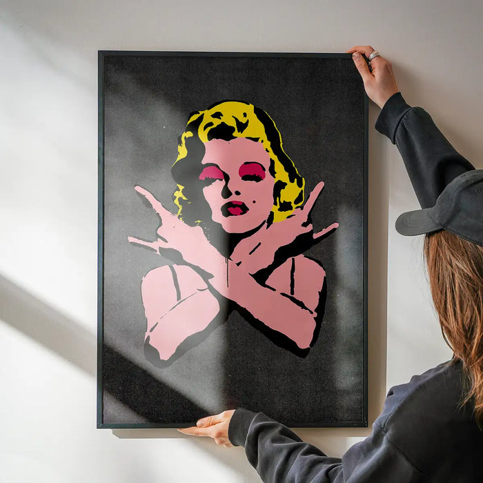 Marilyn Monroe Rock N Roll Stencil Art Graffiti Black Print being hung on a wall in a black frame