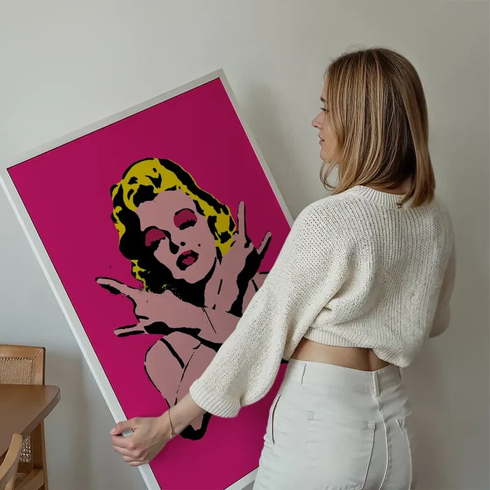 Marilyn Monroe Rock N Roll Stencil Art Graffiti Print held up against a living room wall