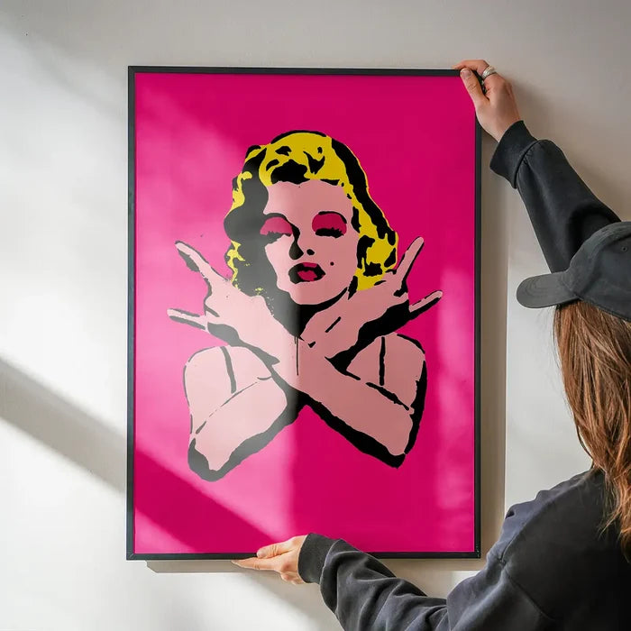Marilyn Monroe Rock N Roll Stencil Art Graffiti Print being hung on a wall in a black frame