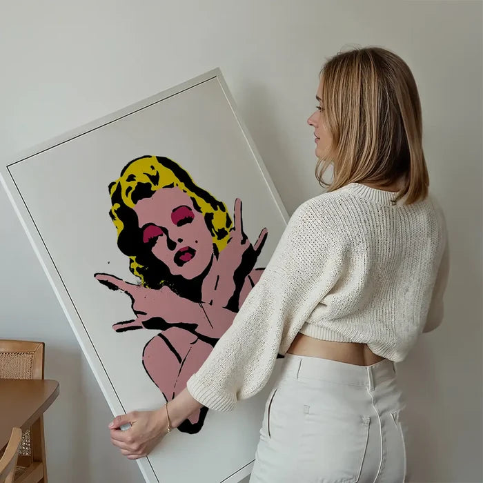 Marilyn Monroe Rock N Roll Stencil Art Graffiti White Print held up against a living room wall