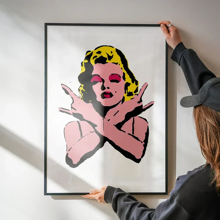 Marilyn Monroe Rock N Roll Stencil Art Graffiti White Print being hung on a wall in a black frame