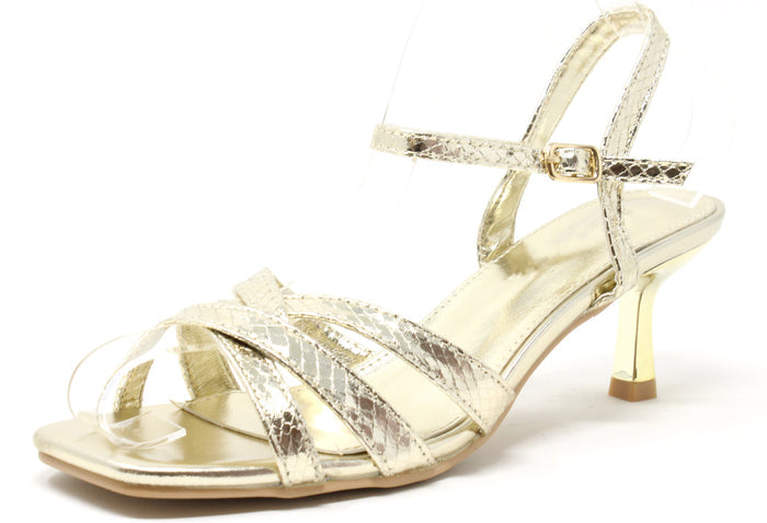 Low heel with a snake design and metallic finish