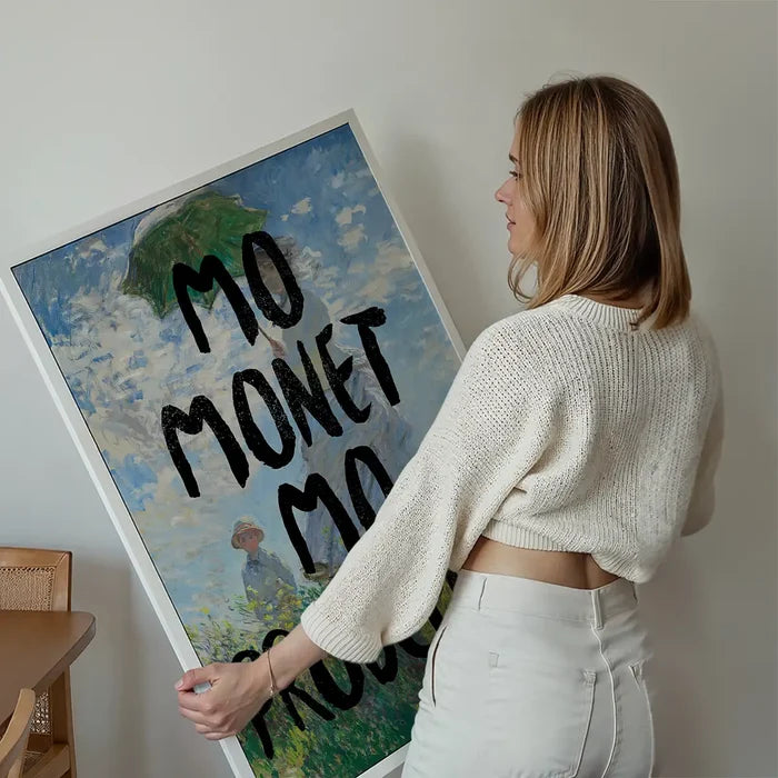 Mo Monet Mo Problems Altered Art Print held up against a living room wall