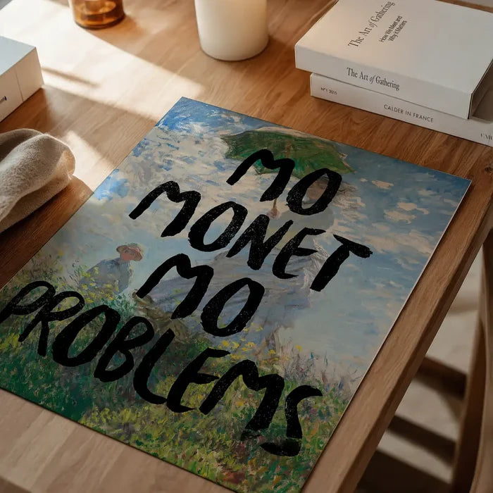Mo Monet Mo Problems Altered Art Print, quirky altered art print unframed on a home office desk