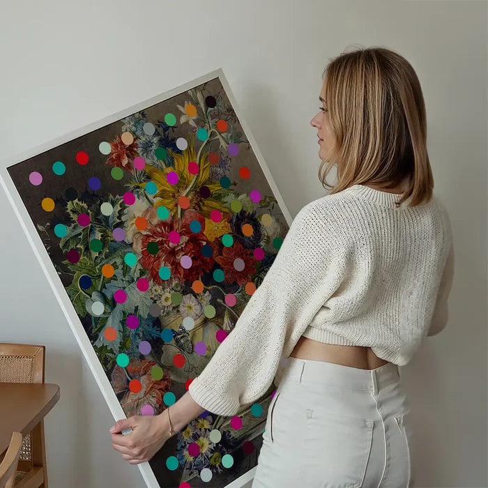Modern Art Dots Flowers Altered Art Print held up against a living room wall