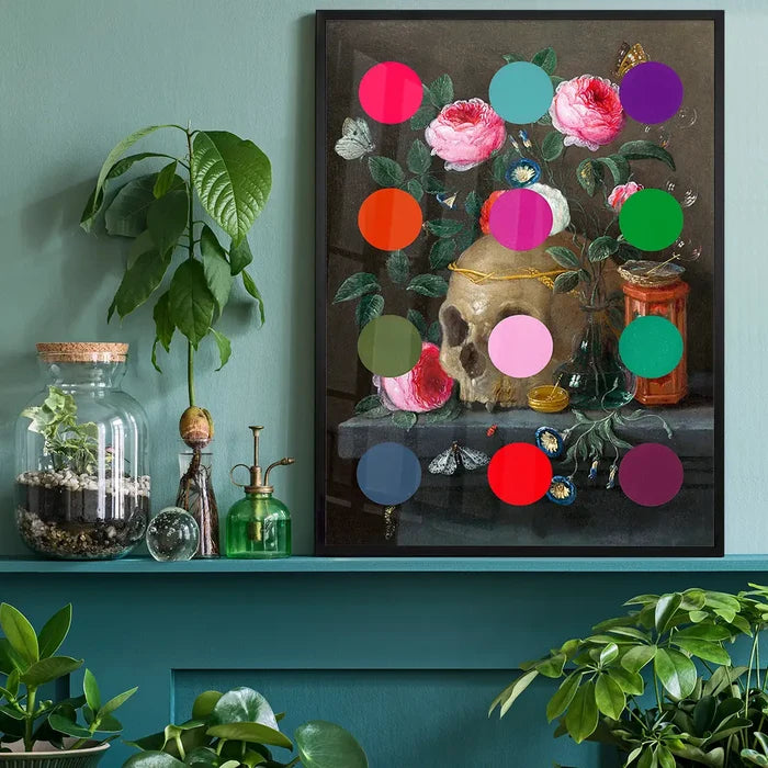 Modern Art Dots Still Life Skull and Flowers Altered Art Print, quirky altered art print black framed on a living room shelf