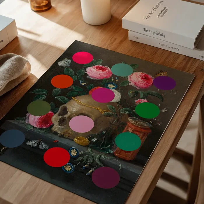 Modern Art Dots Still Life Skull and Flowers Altered Art Print, quirky altered art print unframed on a home office desk