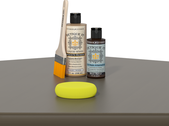 Retique It® Black Walnut Kit with Light Wood’n Primer, Black Walnut Gel Stain Alternative, paintbrush, and yellow sponge on a dark wood tabletop.