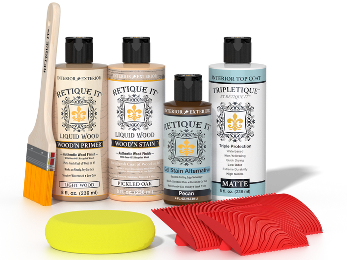 Retique It® Pickled Oak Wood'n Kit with Light Wood primer, Pickled Oak stain, Pecan gel stain alternative, Matte Tripletique® Top Coat, brush, red graining tool, and yellow sponge.