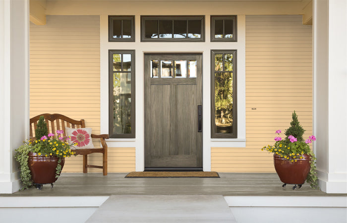 Retique It Wood'n Finish Kit in Weathered Wood applied to a front door, showcasing exterior top coat for wood surfaces.