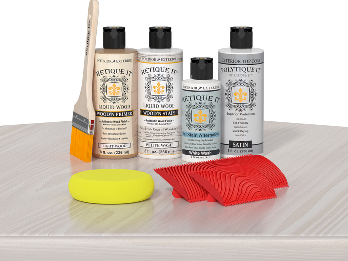 Retique It Wood'n Finish Kit in White Wash with exterior top coat, displayed on table showcasing wood finishing products.