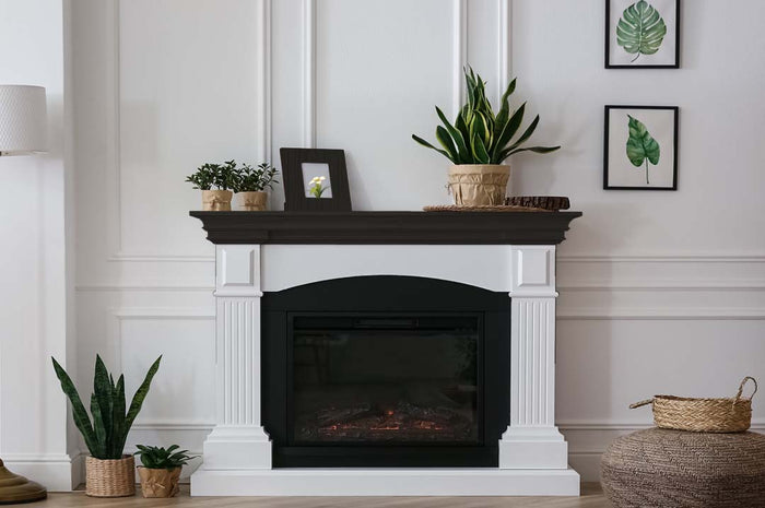 Retique It Wood'n Finish Kit large in classic black, featuring a grained wood mantel for interior fireplace decor.