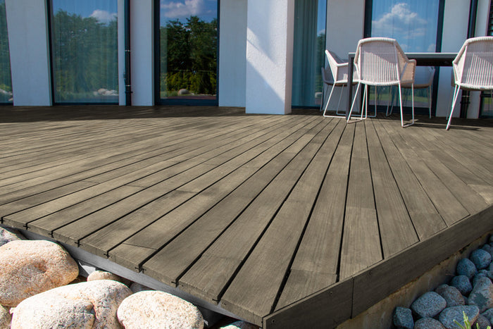 Retique It Decking Wood'n Kit in Drift Wood stain showing rustic wooden decking with a weathered finish.