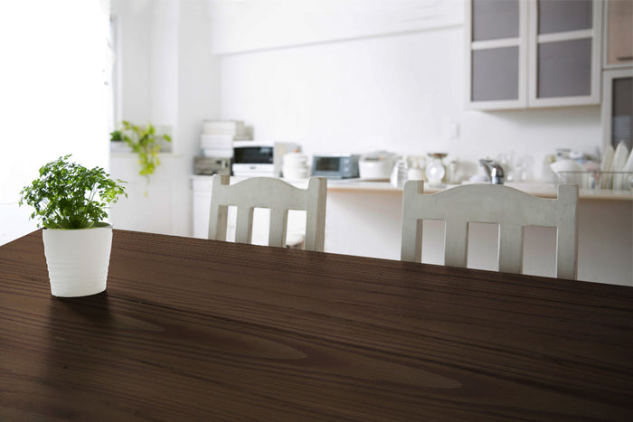 Retique It Wood'n Finish Kit in Black Walnut for interior wood projects, showing a rustic tabletop with natural wood grain.