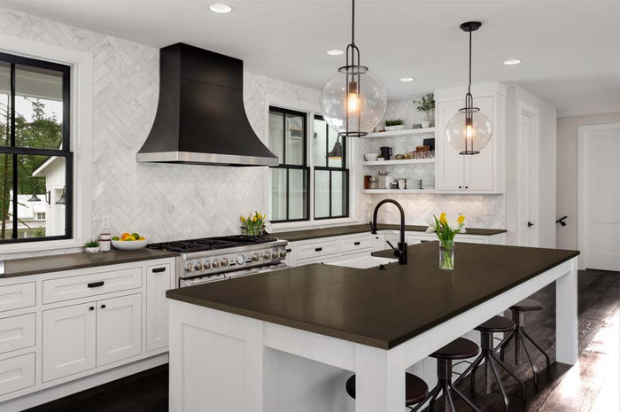Retique It Wood'n Kit in Charcoal for interior wood finishing, shown on kitchen countertop with wood surface.