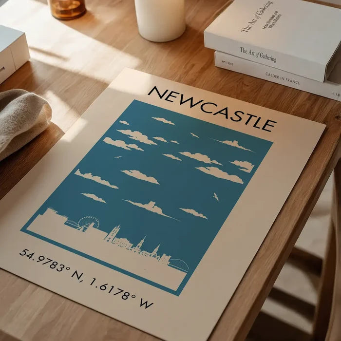 Newcastle Tourist Style Print unframed on a home office desk
