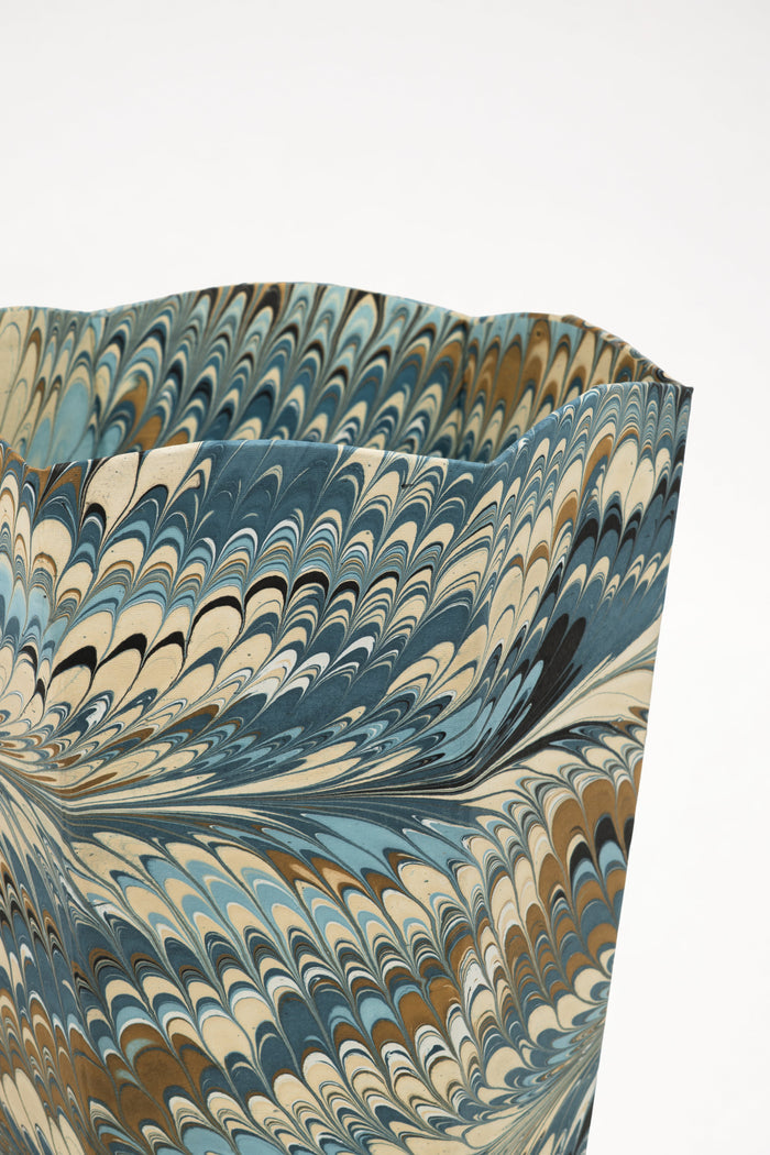 Nila Feathers Marbled Scalloped Wastebasket and Storage Bin — close view of the marbled pattern and shaped edge; Inner Child
