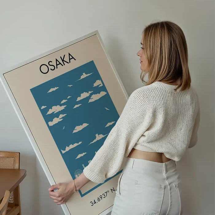 Osaka Tourist Style Print held up against a living room wall