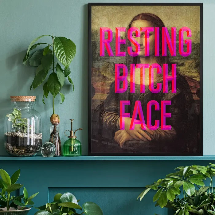 Resting Bitch Face Mona Lisa Print, quirky altered art print black framed on a living room shelf