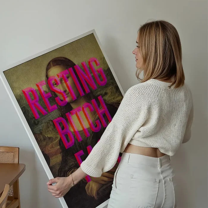 Resting Bitch Face Mona Lisa Print held up against a living room wall