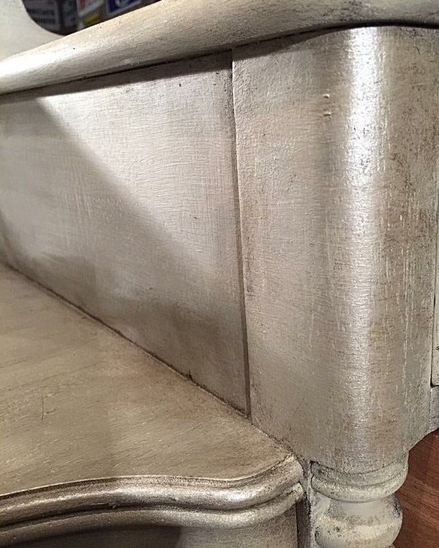 Retique It Clear Furniture Wax in a jar, used as a protective coating and sealant for wood furniture.