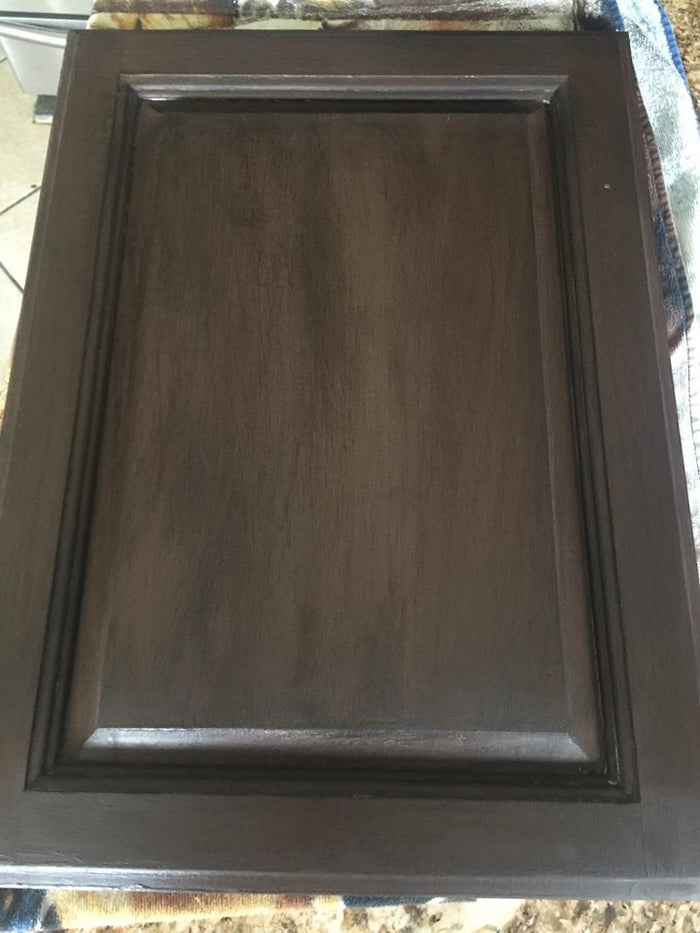 Retique It dark furniture wax in a jar, designed for protective coatings and sealing wood surfaces with a rich, dark finish.