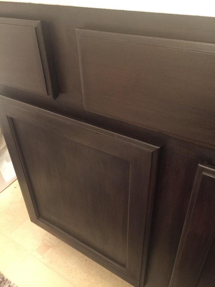 Retique It dark furniture wax in a jar, showing smooth application for protective coatings and sealants on furniture surfaces.