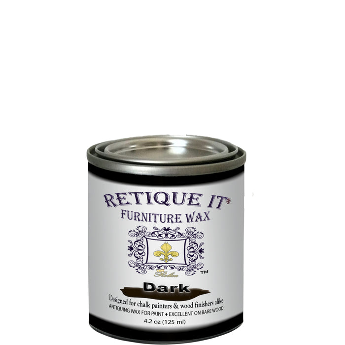 Retique It dark furniture wax in a jar, used as a protective coating and sealant for antique and distressed furniture projects.
