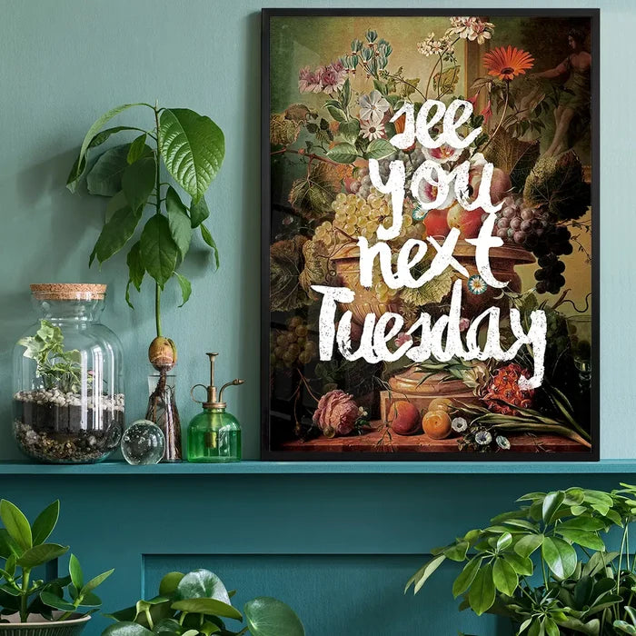 See You Next Tuesday Altered Art Print, floral art print black framed on a living room shelf