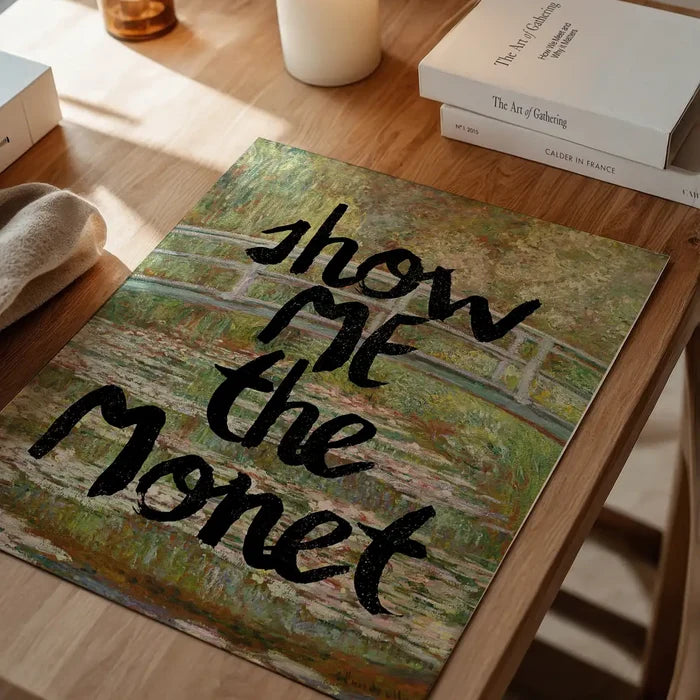 Show Me The Monet Altered Art Print, quirky altered art print unframed on a home office desk