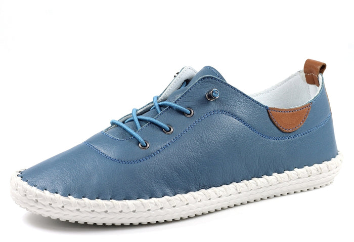 Blue leather plimsoll on a white background