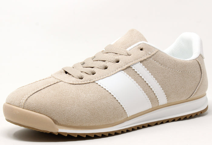 Beige sneaker with white stripes on a light gray background