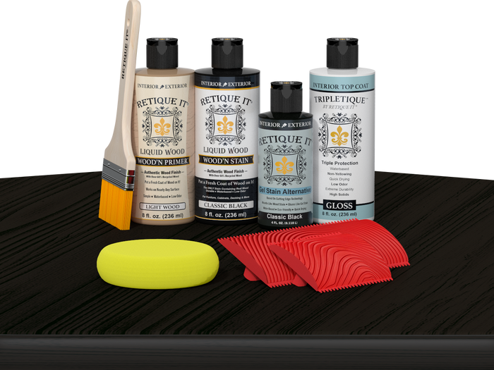 Retique It® Classic Black Wood'n Kit with Light Wood primer, Classic Black stain, Classic Black gel stain alternative, Gloss Tripletique® Top Coat, brush, red graining tool, and yellow sponge.