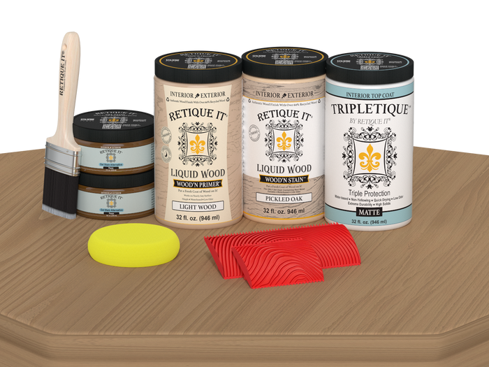 Retique It Wood'n Finish Kit with four large pickled oak stain bottles for wood finishing, matte finish shown on tabletop.