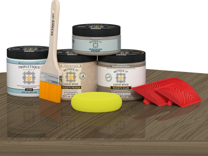 Retique It Wood'n Finish Kit Double Size in Weathered Wood stain, featuring wood stain bottles and applicator tools on a table.