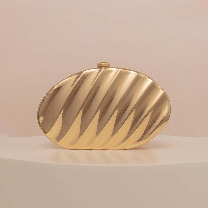 Textured metallic clutch with sculpted wave design – SHELL